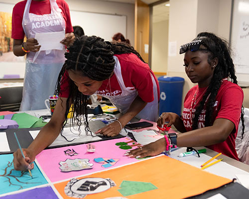 Precollege Academy students working on project